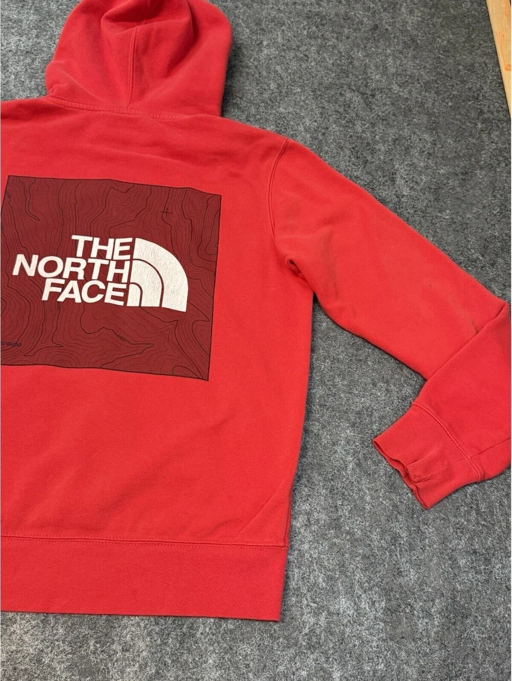 The North Face Men’s Small Red Pullover Hoodie Topographic Logo Graphic.